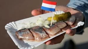 Food comp 1 : Dutch food. 1. Stroopwafel, crunchy waffle with syrupy liquid inside 2. Frikandel : Basicially a meat-stick which is made out of pork, chicken and